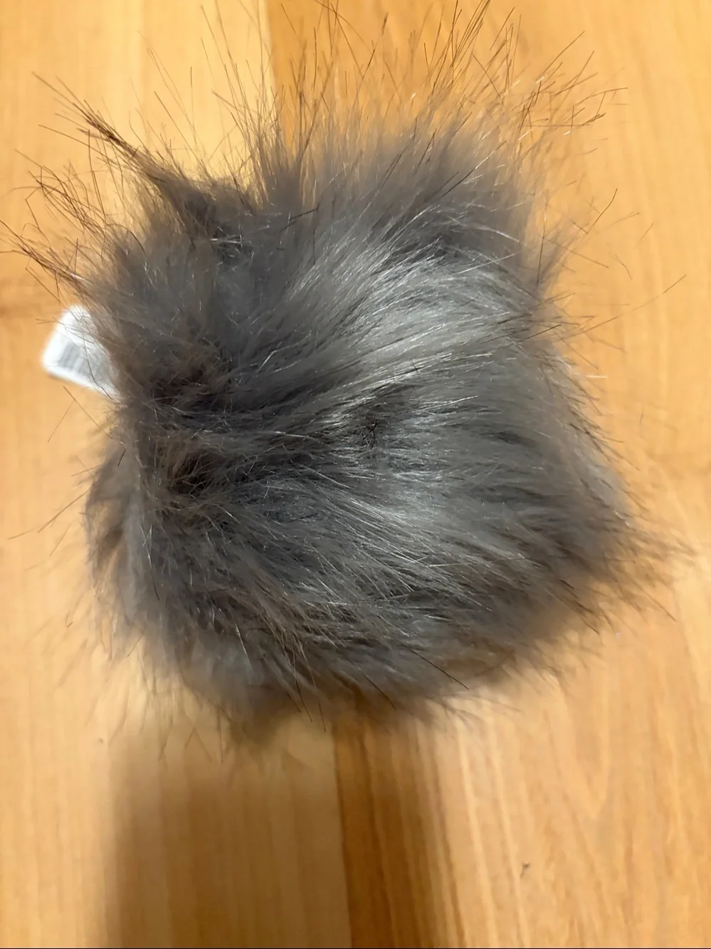 Gray Pom Pom with elastic holder